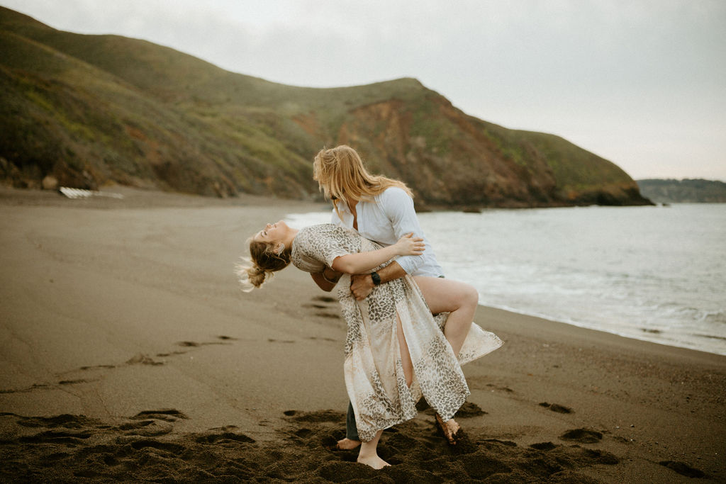 Reno Wedding Photographer captures dip kiss between newly engaged couple