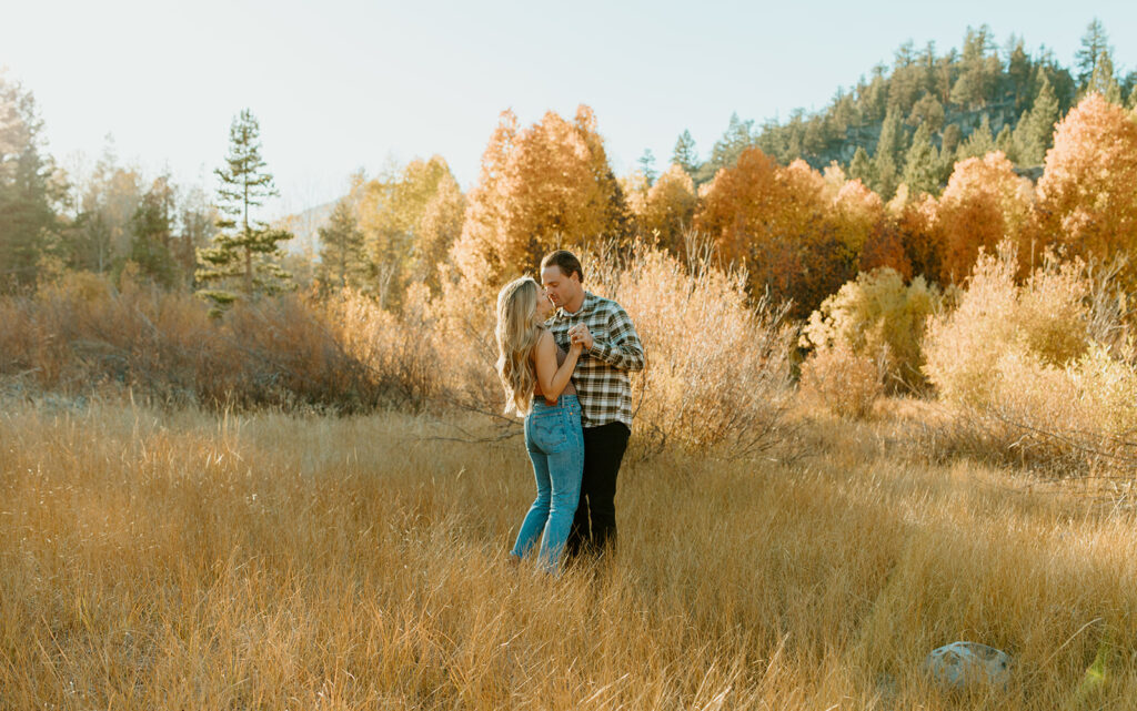 Wedding Photographers Reno capture couple dancing together during engagement session in Hope Valley