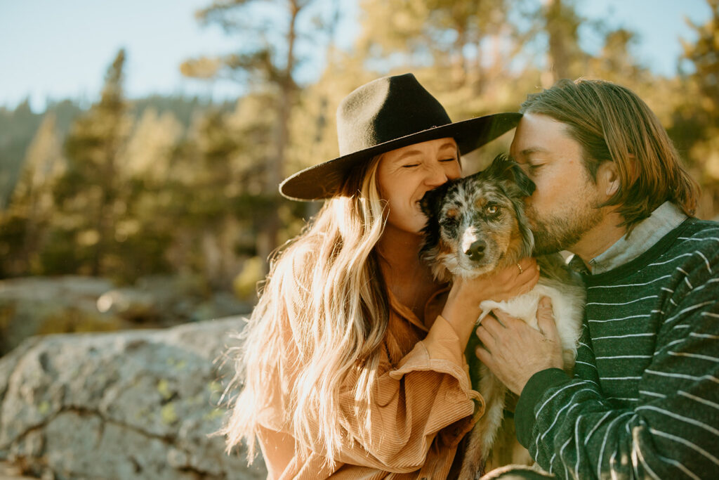 Wedding Photographers Reno capture couple kissing dog during dog-friendly engagement session