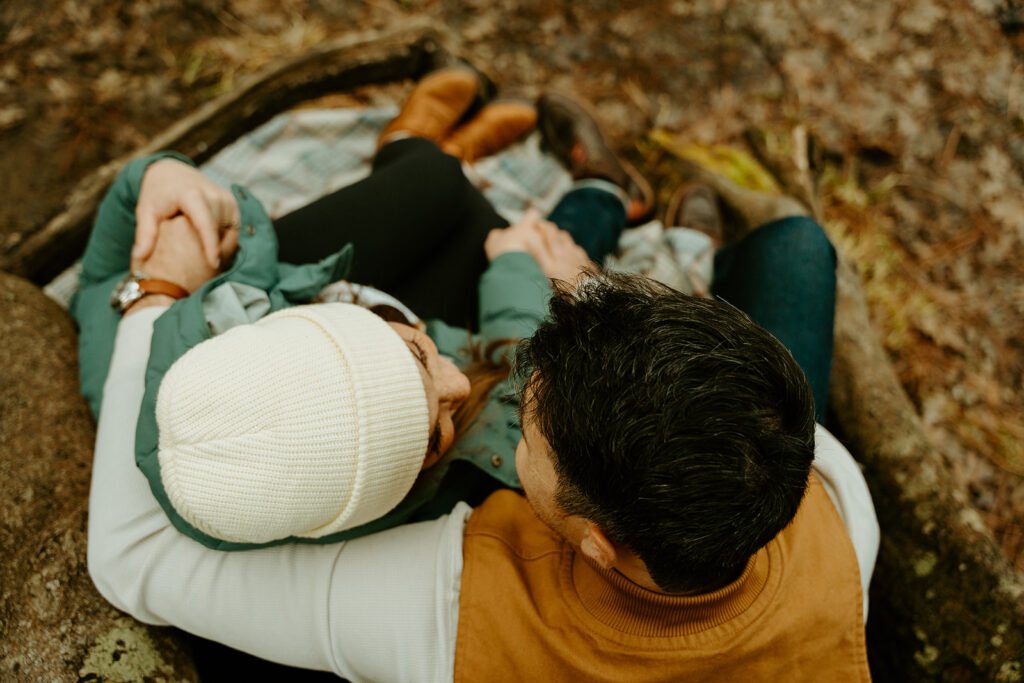 Yosemite wedding photographer captures couple embracing during picnic 