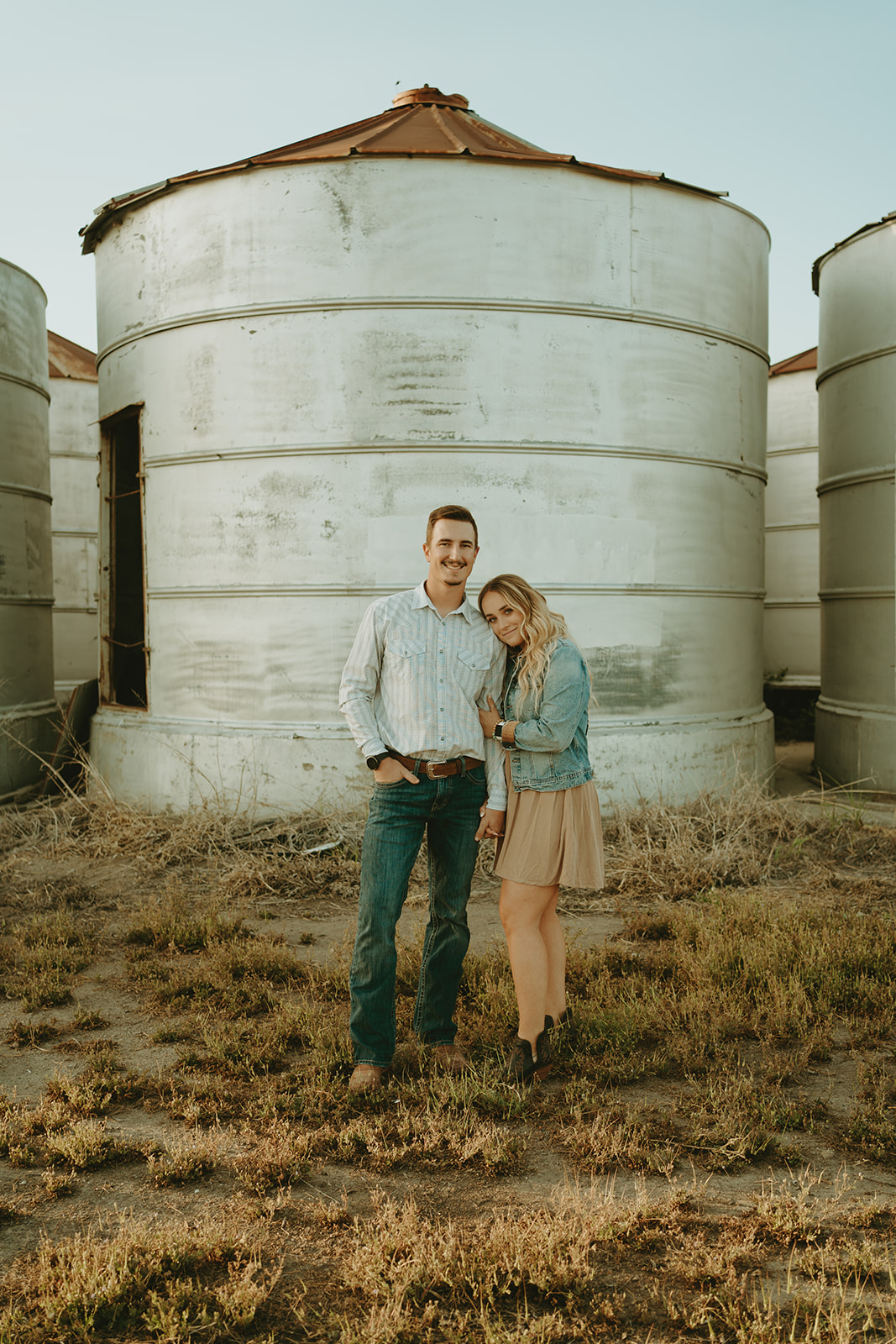 Reno wedding photographer captures man and woman smiling after surprise proposal
