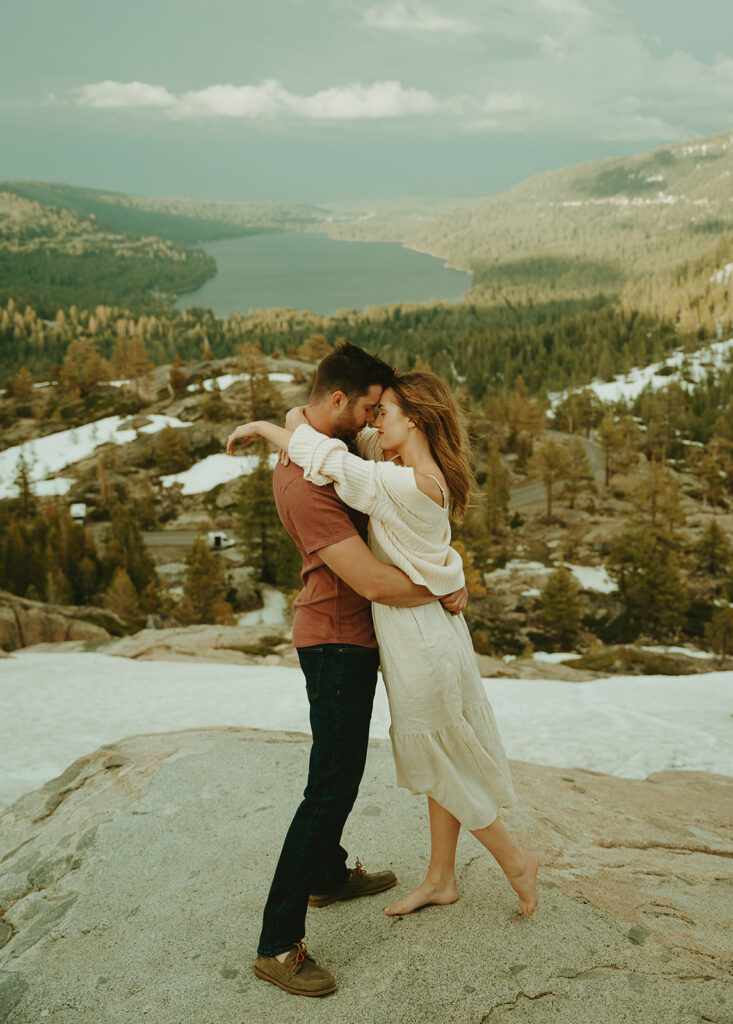 Reno Wedding Photographer captures couple embracing on boulder