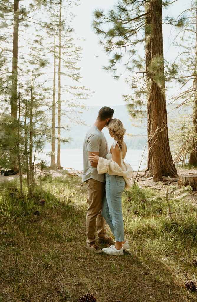 Reno Wedding Photographer captures couple hugging in forest