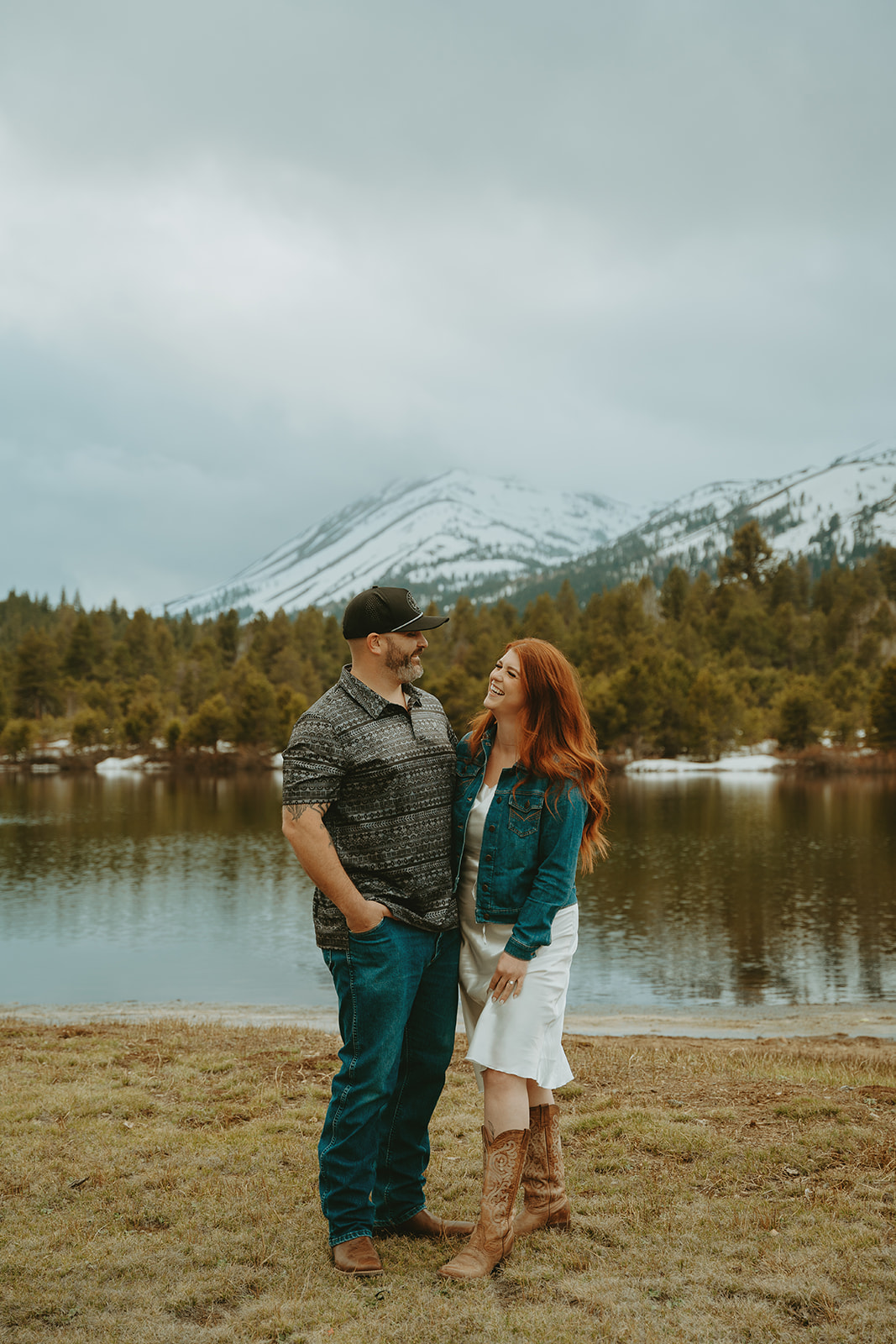 Reno wedding photographer captures man and woman looking at one another during outdoor engagement photos