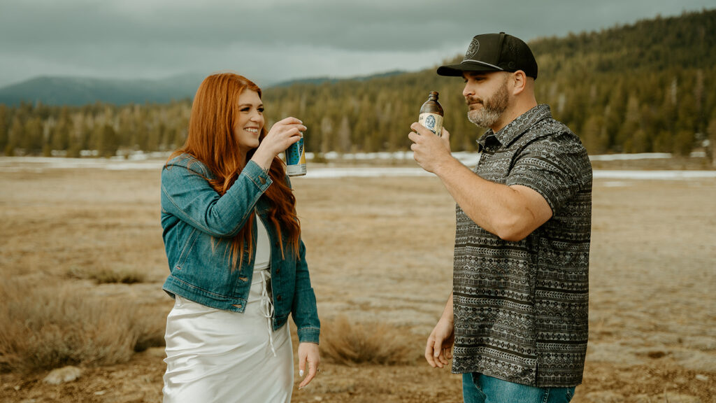 Reno wedding photographer captures man and woman drinking together during engagement photos