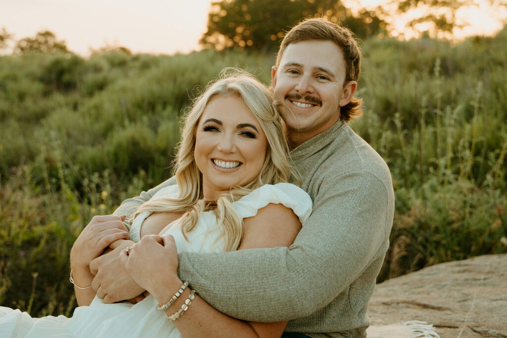 Reno Wedding Photographer captures man and woman smiling during outdoor engagement photos