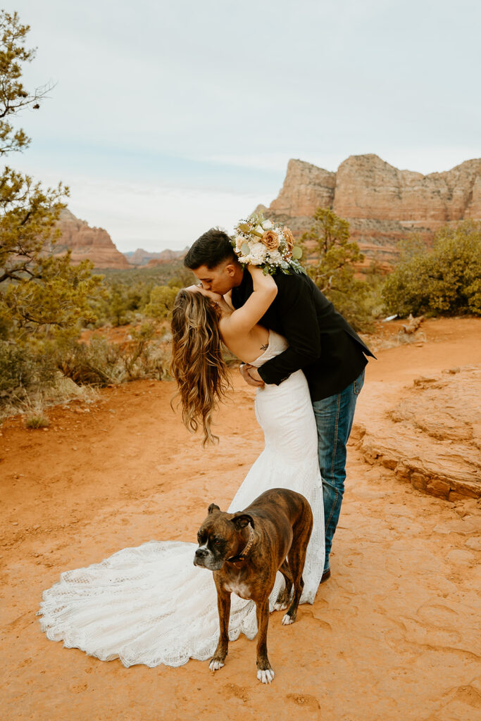 Reno Wedding Photographer captures dip kiss between bride and groom