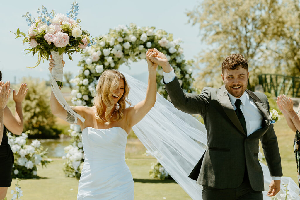 Reno Wedding Photographer captures bride and groom celebrating recent marriage