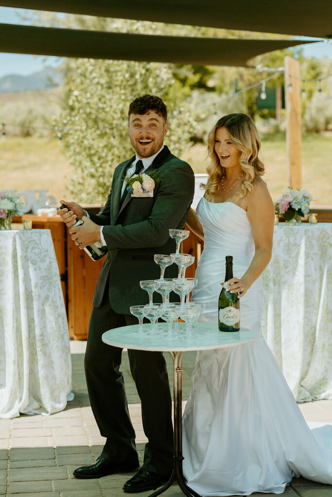 Reno Wedding Photographer captures groom popping champagne