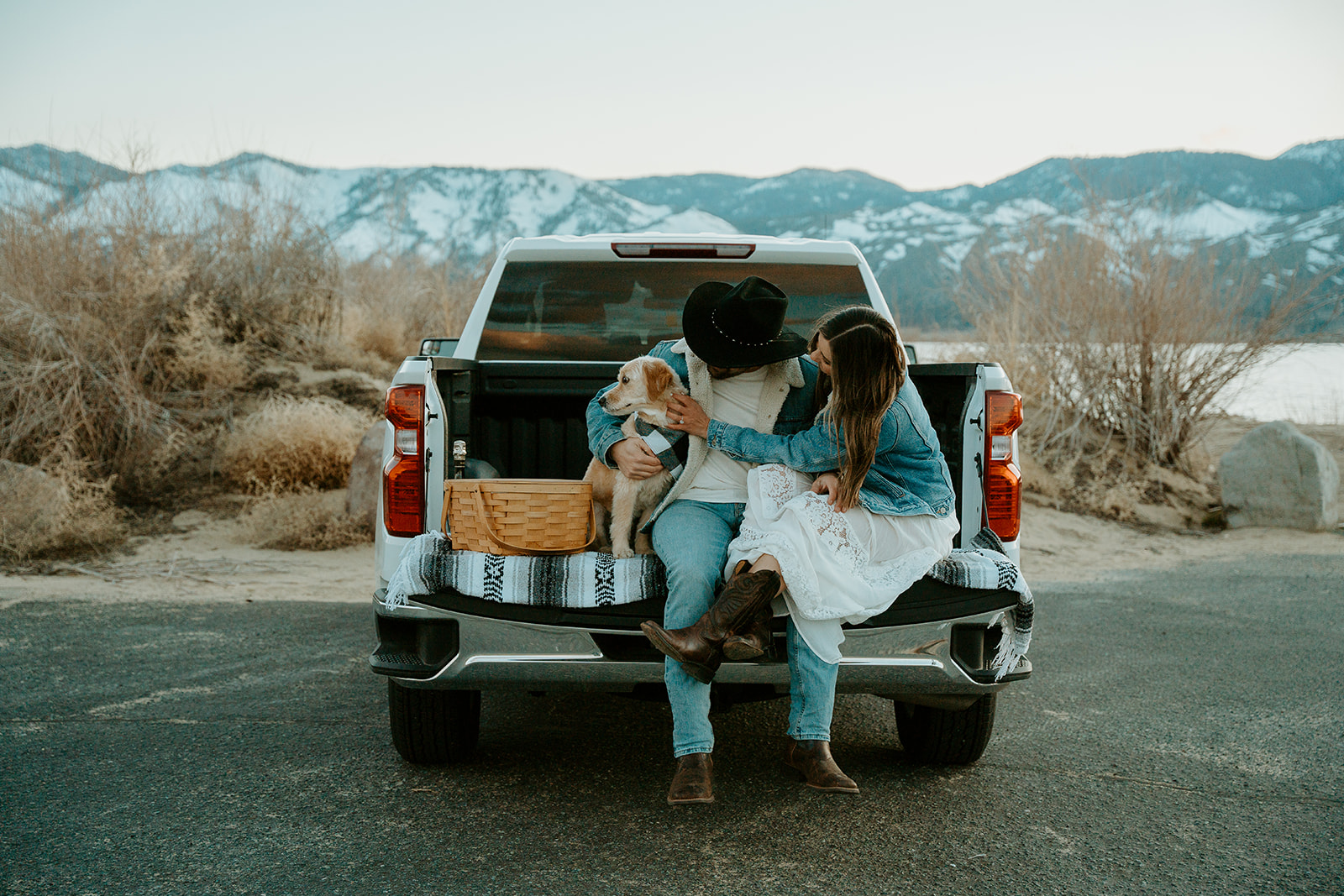 Reno Wedding Photographer captures couple celebrating on truckbed with dog