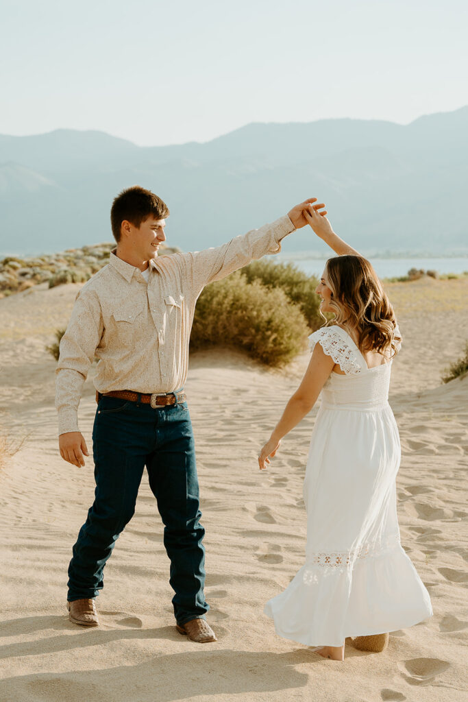 Reno Wedding Photographer captures couple dancing during outdoor engagements