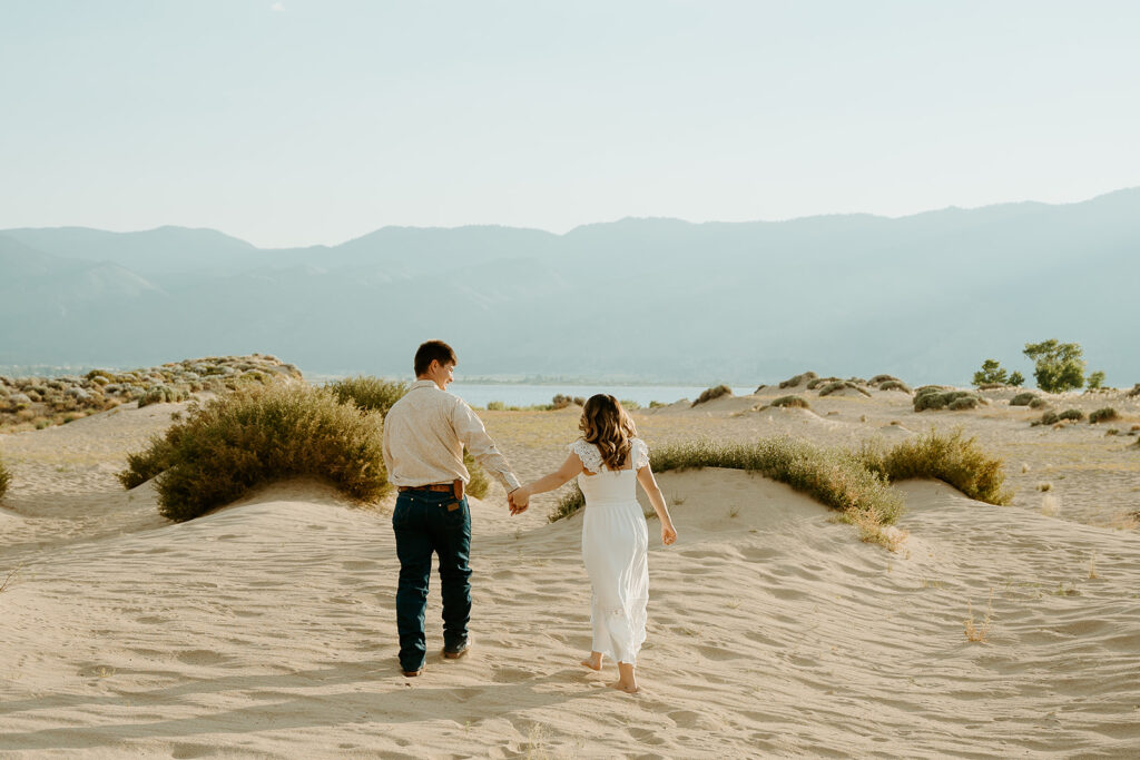 Reno Wedding Photographer captures couple walking together hand in hand